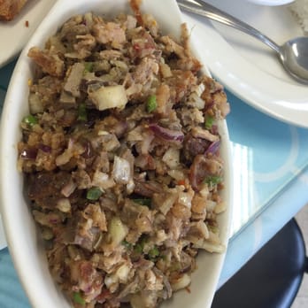 Guiradelco - Sisig...a delicious blend of pork meat, pork liver, onions and spicy peppers - Filipino Near Me - Westbury, New York