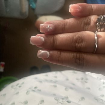 Tango Nails - Bead not even in the middle of the "flower" - Nail Salons Near Me - Huntsville, Texas