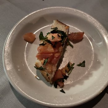 Bruno's Ristorante - Bruschetta appetizer! One small piece of it. - Italian Near Me - Irving, Texas