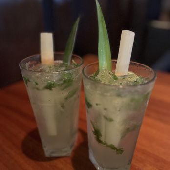 Mi Cocina - two glasses of mojit on a table - Mexican Near Me - Rockwall, Texas