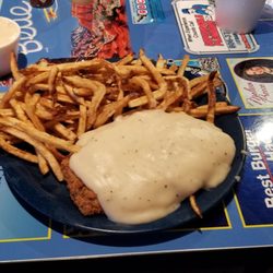 Delicious chicken fried steak with gravy and fresh cut fries . $10.49