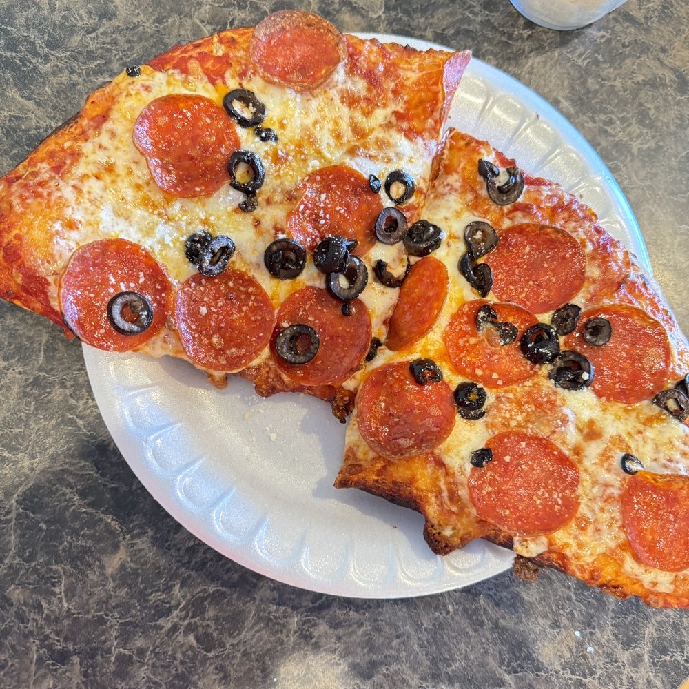 Two slices pepperoni & black olives.