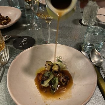 Albi - Skewered octopus with chick peas and harissa broth - Middle Eastern Near Me - Washington, DC, District of Columbia