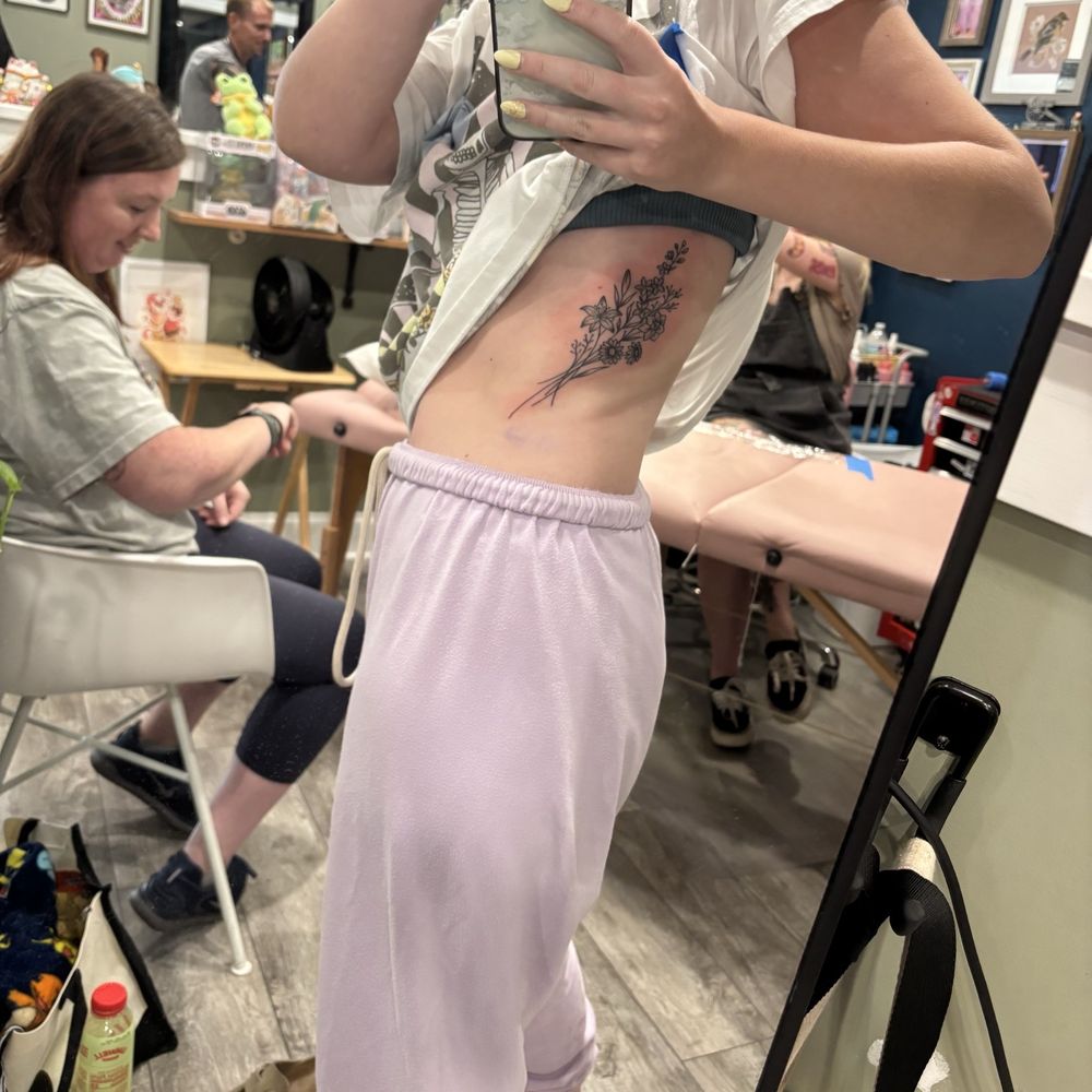 Blue Heron Tattoo - Rib floral piece - Tattoo Near Me - Charles Town, West Virginia Blue Heron Tattoo - Rib floral piece - Tattoo Near Me - Charles Town, West Virginia