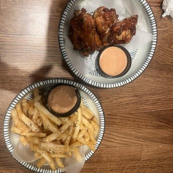 Pho Broth - Garlic wings and truffle fries - Vietnamese Near Me - Huntington Beach, California Pho Broth - Garlic wings and truffle fries - Vietnamese Near Me - Huntington Beach, California