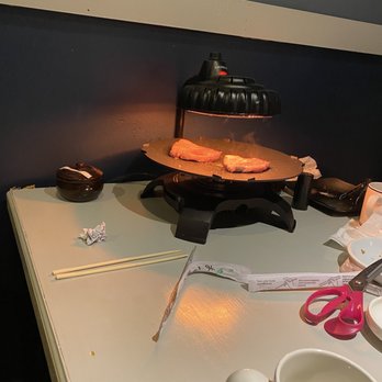 Danji - a table with a cake and a cup of coffee - Korean Near Me - Greensboro, North Carolina