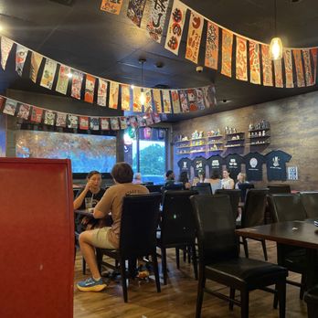 Uni Sushi & Ramen - people sitting at tables in a restaurant - Sushi Bars Near Me - East Lansing, Michigan Uni Sushi & Ramen - people sitting at tables in a restaurant - Sushi Bars Near Me - East Lansing, Michigan