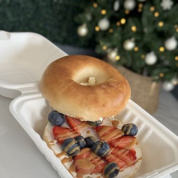 The Urban Press - Bagel with cream cheese topped with berries and peanut butter - Juice Bars & Smoothies Near Me - McFarland, California The Urban Press - Bagel with cream cheese topped with berries and peanut butter - Juice Bars & Smoothies Near Me - McFarland, California