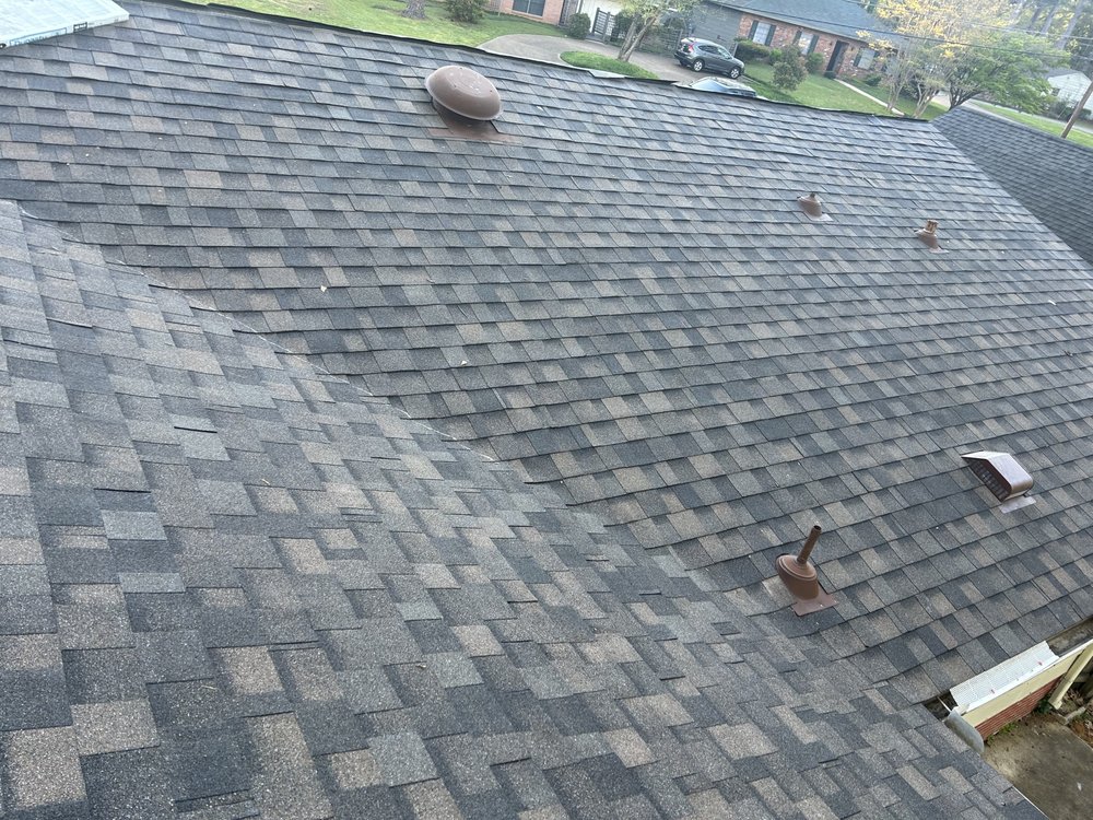 Slide of Monarch Roofing