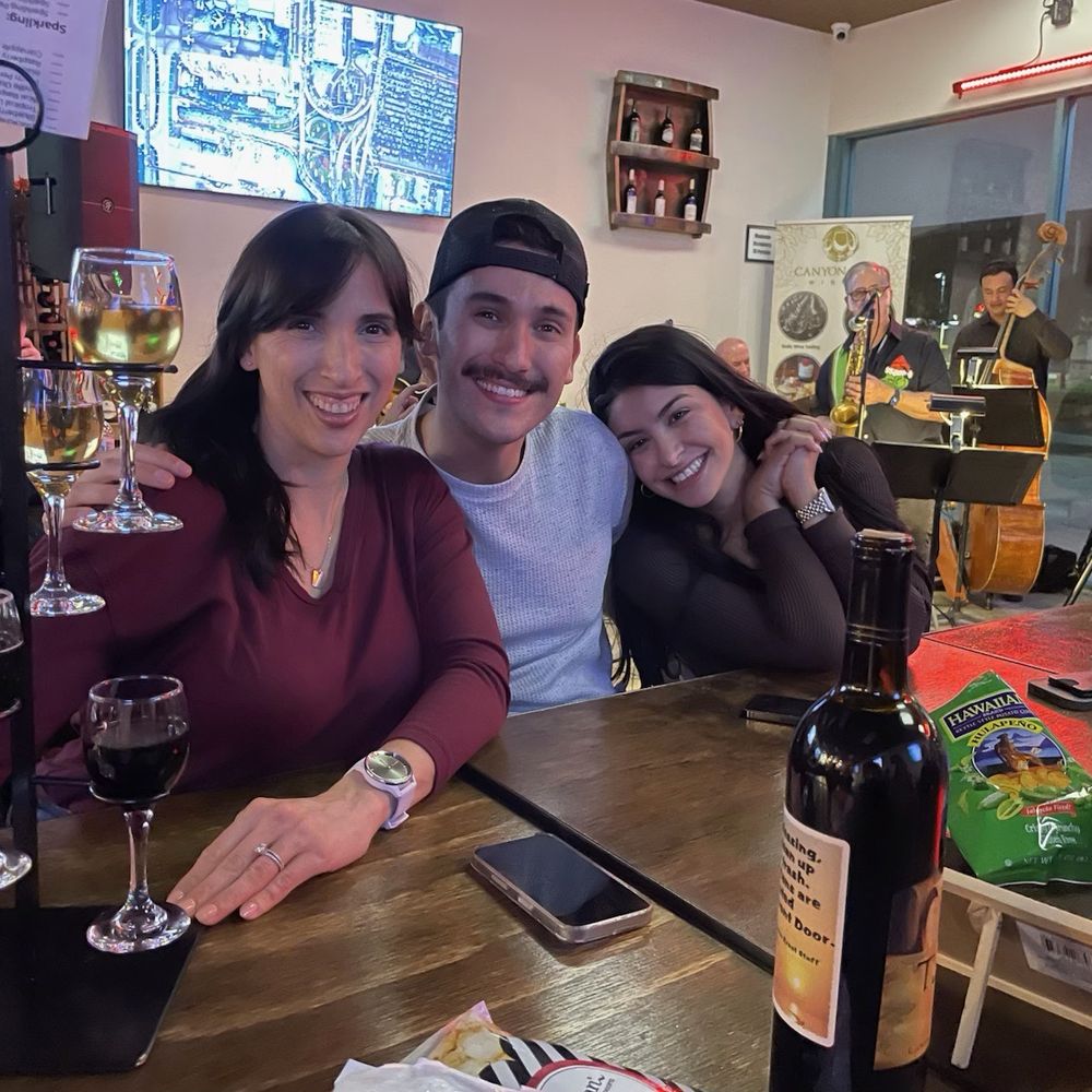 Erika, John & Christina enjoying their wine flights