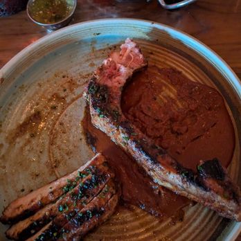 Casa Pantera - The tomahawk pork chop and steak fries - Steakhouses Near Me - El Paso, Texas