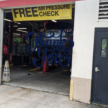 Tires Plus - One of the bays.  The service area was average clean at 3pm. - Tires Near Me - Tampa, Florida