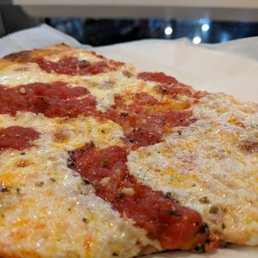a slice of pepperoni pizza