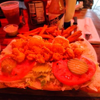 Coop's Place - Shrimp and crawfish fully dressed poboy. - Cajun/Creole Near Me - New Orleans, Louisiana Coop's Place - Shrimp and crawfish fully dressed poboy. - Cajun/Creole Near Me - New Orleans, Louisiana