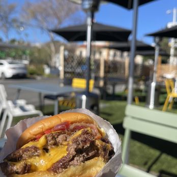 Shake Shack West Hollywood - Santa Monica & La Cienega - Enjoying a SmokeShack double bacon cheeseburger on the new outdoor dining area at Shake Shack in West Hollywood. - Burgers Near Me - Los Angeles, California Shake Shack West Hollywood - Santa Monica & La Cienega - Enjoying a SmokeShack double bacon cheeseburger on the new outdoor dining area at Shake Shack in West Hollywood. - Burgers Near Me - Los Angeles, California