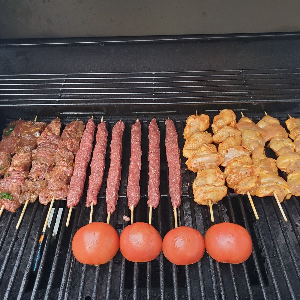 Alameda Market - skewers of meat and tomatoes on a grill - Meat Shops Near Me - Burbank, California Alameda Market - skewers of meat and tomatoes on a grill - Meat Shops Near Me - Burbank, California