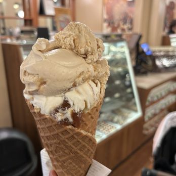 Kilwins Ice Cream - Chocolate - Fudge - Dulce De Leche (Top) and Sea Salt Carmel on a Waffle Cone - Candy Stores Near Me - Wilmington, North Carolina Kilwins Ice Cream - Chocolate - Fudge - Dulce De Leche (Top) and Sea Salt Carmel on a Waffle Cone - Candy Stores Near Me - Wilmington, North Carolina