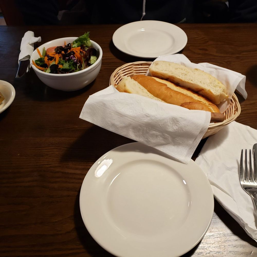 Complimentary warm bread with butter and salad with our order of entree Complimentary warm bread with butter and salad with our order of entree