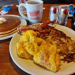 dried up eggs, burnt hashbrowns and undercooked bacon. dried up eggs, burnt hashbrowns and undercooked bacon.