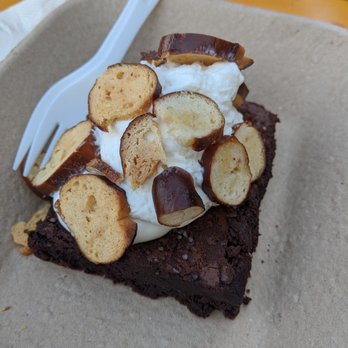 Wursthall - Brownie with whipped cream and pretzel chips. I asked for no caramel sauce. - German Near Me - San Mateo, California