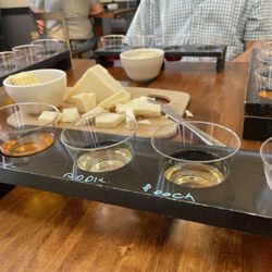 Sweet Baby Vineyard - A flight tasting with our choice of wines and a cheeseboard for 4. (My kids milk from home)