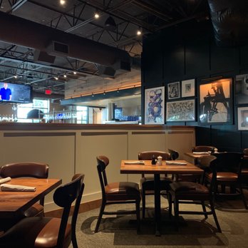 Burtons Grill & Bar - The back corner has booths and tables and is cozy. - New American Near Me - Boca Raton, Florida