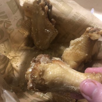 Wingstop - Garlic Parmesan wings are just completely plain wings with powdered Parmesan.... over cooked and dry wtf why did I wait 25 minutes for this - Chicken Wings Near Me - Vancouver, Washington