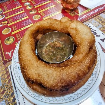 Nepali Bhanchha Ghar - Sel Roti. $2 each. Oily, but tasty - Himalayan/Nepalese Near Me - Jackson Heights, New York