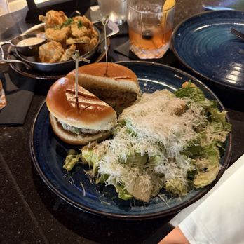 Eureka! - Caesar salad  old fashion and the burger wyagu and friend pickles - American Near Me - Austin, Texas