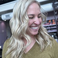 Spoleti Salon - Platinum blonde highlights that turn heads. Book your next bright blonde look at our Pflugerville salon.