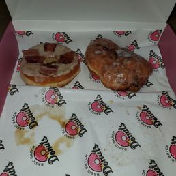Maple bacon donut and apple fritter. Maple bacon donut and apple fritter.