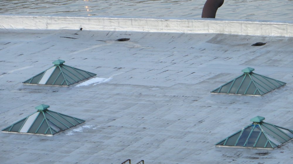 Slide of Duque Roofing