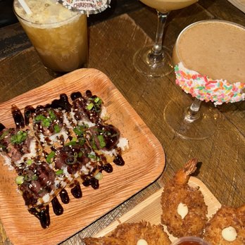 Stowaway - 3 holiday drinks, poke nachos, fried shrimp - Tiki Bars Near Me - Tustin, California