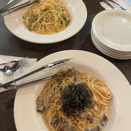 Top: uni pasta Bottom: mentai cream Japanese style pasta Top: uni pasta Bottom: mentai cream Japanese style pasta