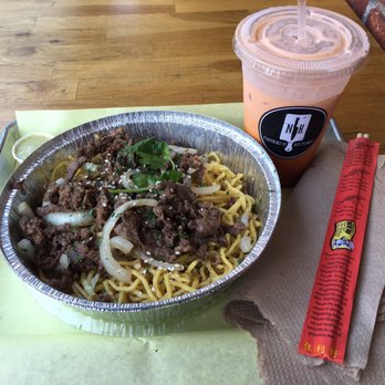 Nguyen's Kitchen - My lunch: Garlic Noodles with a Thai Tea (no boba) - Vietnamese Near Me - Orange, California