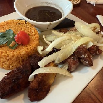 Palermo Puerto Rican Kitchen - Fried pork chunks, yellow rice, black beans, fried sweet plantains. - Puerto Rican Near Me - Orange Park, Florida Palermo Puerto Rican Kitchen - Fried pork chunks, yellow rice, black beans, fried sweet plantains. - Puerto Rican Near Me - Orange Park, Florida