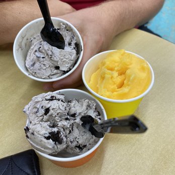 Tropical Treats - Cookies & cream ice cream and mango italian ice - Ice Cream & Frozen Yogurt Near Me - Oak Island, North Carolina Tropical Treats - Cookies & cream ice cream and mango italian ice - Ice Cream & Frozen Yogurt Near Me - Oak Island, North Carolina