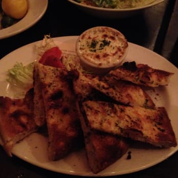 Piatti - Flat bread (with goat cheese from the wood oven and four hour tomato). - Italian Near Me - Mill Valley, California Piatti - Flat bread (with goat cheese from the wood oven and four hour tomato). - Italian Near Me - Mill Valley, California