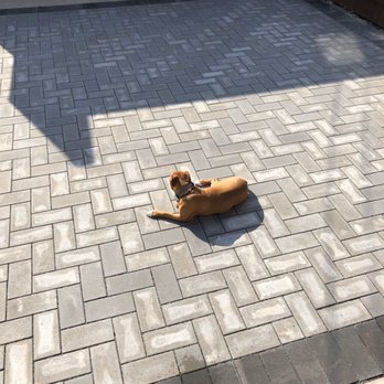 Lopez Concrete & Brick Paving - Grass removed and pavers placed. Dogs love it. - Masonry/Concrete Near Me