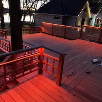 5JD Construction - a deck at night - General Contractors Near Me