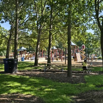Village Green - Shaded picnic tables overlooking the playground area - Parks Near Me - Northbrook, Illinois Village Green - Shaded picnic tables overlooking the playground area - Parks Near Me - Northbrook, Illinois
