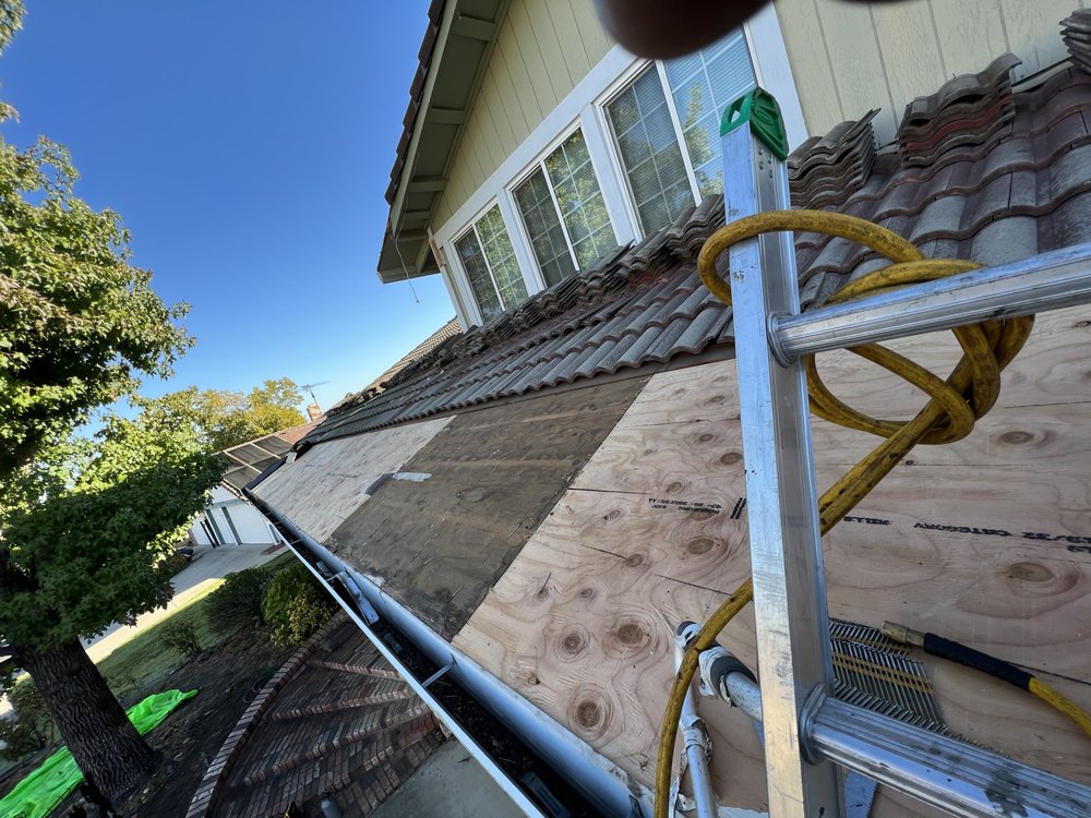 Slide of AC Roof Services