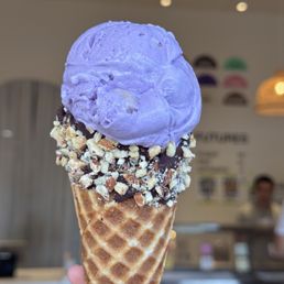 Ube Crush on a Manoa Chocolate dipped waffle cone Ube Crush on a Manoa Chocolate dipped waffle cone