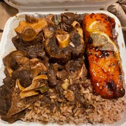 Reggae Cuisine - Oxtail with rice and peas and jerk salmon. 10/10 GO GET SOME!!!