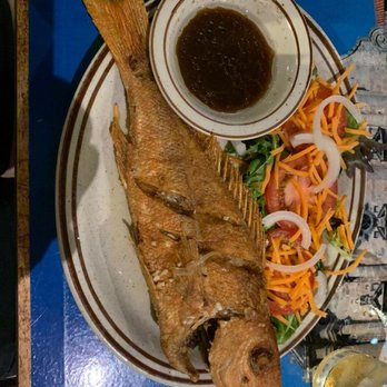 Nini's Cuban Cuisine - Whole Fried Snapper delicious comes with side salad and beans, rice - Cuban Near Me - Indialantic, Florida