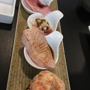 One Piece Sushi - Sampler of the lobster salad, smoked salmon, (can't recall the middle one) hamachi, and Aji. - Japanese Near Me - Millbrae, California One Piece Sushi - Sampler of the lobster salad, smoked salmon, (can't recall the middle one) hamachi, and Aji. - Japanese Near Me - Millbrae, California