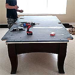 The Corner Pocket Pool Table Services - At work, moving a table