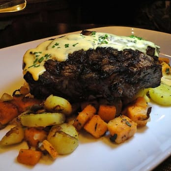 Vintage Tavern - Rib eye of a bed of sweet potatos (and regular potatos)! - Southern Near Me - Suffolk, Virginia Vintage Tavern - Rib eye of a bed of sweet potatos (and regular potatos)! - Southern Near Me - Suffolk, Virginia