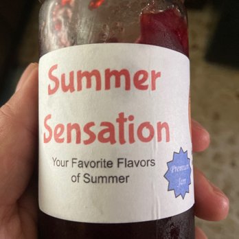Soaring Swine Acres - a hand holding a jar of jam - Specialty Food Near Me - Yucaipa, California Soaring Swine Acres - a hand holding a jar of jam - Specialty Food Near Me - Yucaipa, California