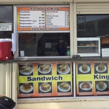 Sandwich King - menus on the window of a restaurant - Sandwiches Near Me - Miami, Florida
